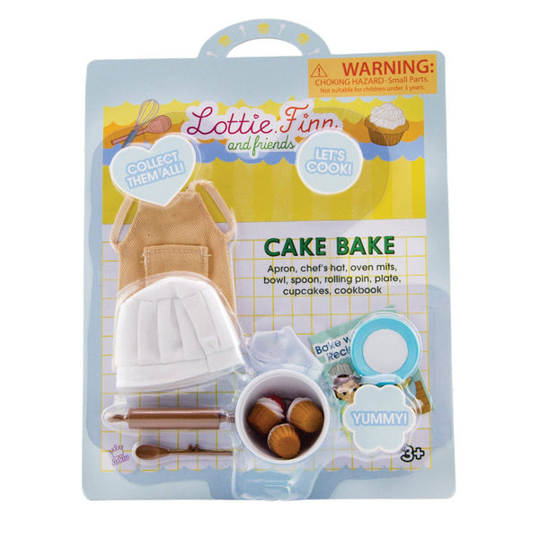 Retail package of Doll apron, mixing bowl, chef hat, mitt, rolling pin, spoon, cupcakes and recipe book
