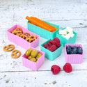 6 piece silicone cups in pink and teal. 2 large rectangle shape and 4 smaller squares to help separate food.