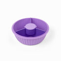 Purple bowl with 4 compartments with food and 1 center compartment to hold sauce, dressing, etc