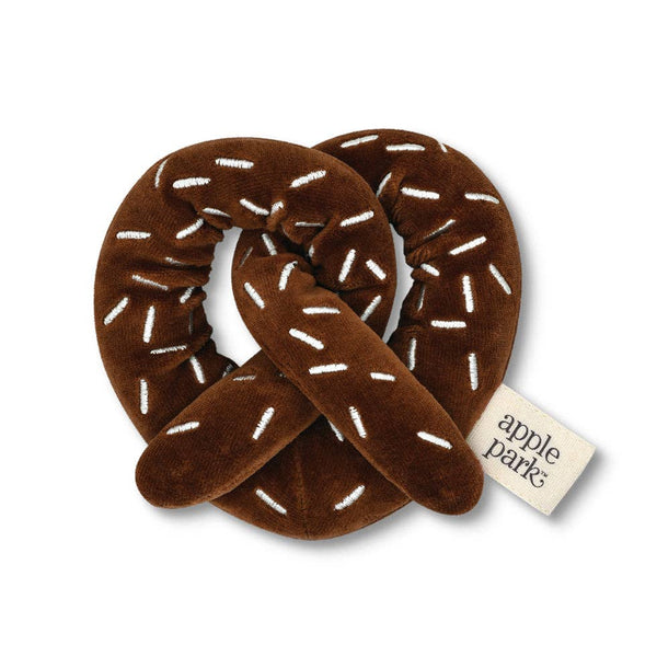 Brown Pretzle Shape rattle with white "sprinkles"