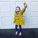 Lottie loves rainy days! Dressed in her raincoat and boots, she’s ready for muddy adventures in Branksea’s Daffodil Fields, splashing in puddles with her friends!