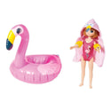 Strawberry Blonde Lottie in Swimsuit, yellow floaties, and towel and inflatable flamingo