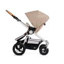 Era Stroller in Sand with silver frame and cork handlebar