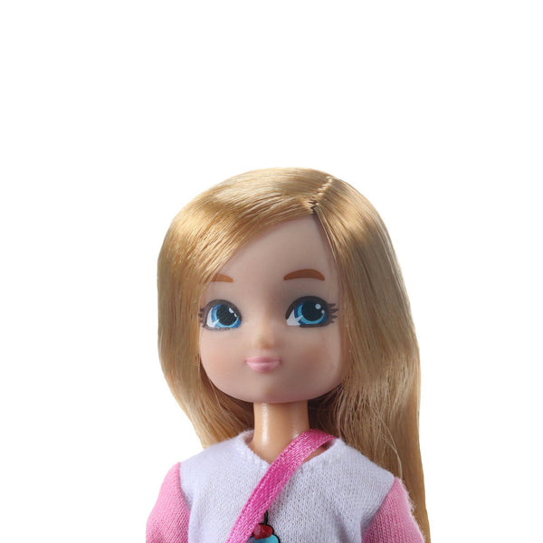 doll is dressed in a cupcake-print t-shirt, silver tutu, grey and pink leggings, silver trainers, and carries a sparkly deep pink bag. She also comes with 3 mini cards: an invitation, birthday, and thank you card.