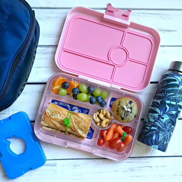 Open Yumbox box with food in it. The Blue Icepack featured beside