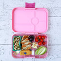 Yumbox with food inside and 1 rectangle cup to separate the salad