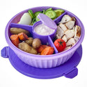 Purple bowl with 4 compartments with food and 1 center compartment to hold sauce, dressing, etc